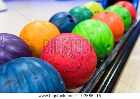 A colorful bowling balls in return machine