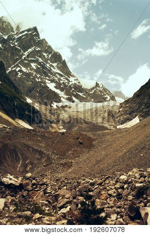 Glacier Against The Backdrop Of The Mountain Peaks