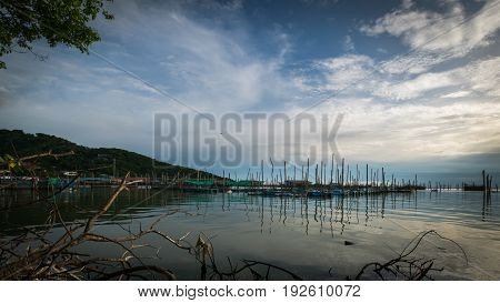 Homestay and floating basket in lake at Kohyo Songkhla Thailand with beautiful sky and clouds. This is traditional fisheries area.