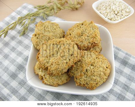 Freshly baked rolled oats cookies in a bowl