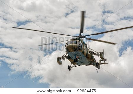 Russian Military Helicopter Mi-8 In The Cloudy Sky