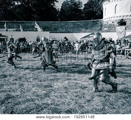 TROSTYANETS, UKRAINE - JUNE 25, 2017: Old Castle fest in action. Knights fight just beginning. This is 8 time traditional fest with historical costumes, foods and fights.