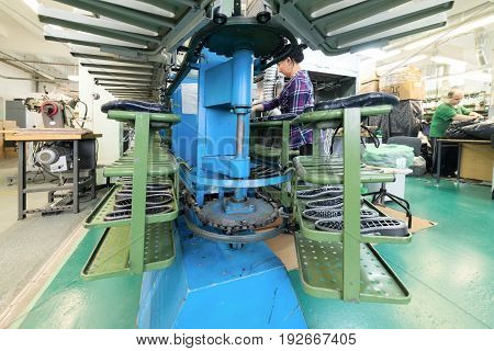 MOSCOW, RUSSIA - FEBRUARY 21, 2017: Moscow shoe factory JSC RALF RINGER. The conveyor of the shoe factory