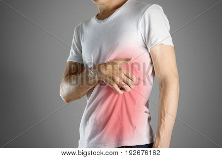 Guy In White Shirt Scratching His Body. Scabies. Scratch The Body. Isolated