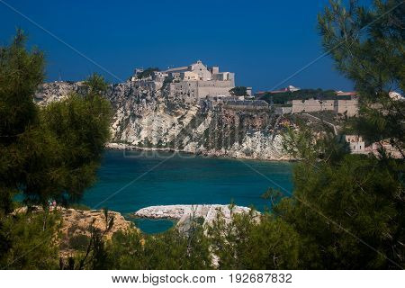 A view of San Nicola island from the nearby San Domino island, with the Abbey of Santa Maria a Mare fortified complex