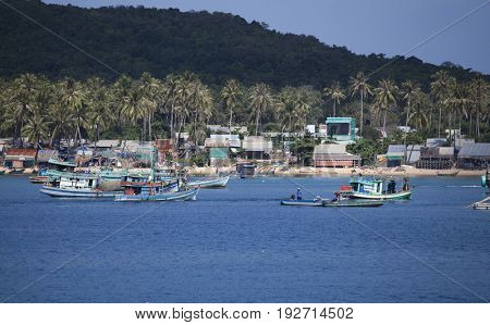 PHU QUOC, VIETNAM - March 21, 2017: Lifestyle of fishermen on their boats in An Thoi pier village, Phu Quoc island, Vietnam