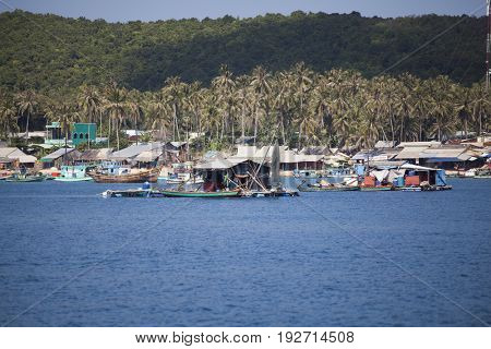 PHU QUOC, VIETNAM - March 21, 2017: Lifestyle of fishermen on their boats in An Thoi pier village, Phu Quoc island, Vietnam
