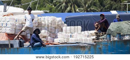 PHU QUOC, VIETNAM - March 21, 2017: Lifestyle of fishermen on their boats in An Thoi pier village, Phu Quoc island, Vietnam