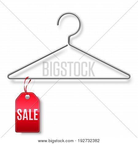 Clothes hanger with red sale tag isolated on white background