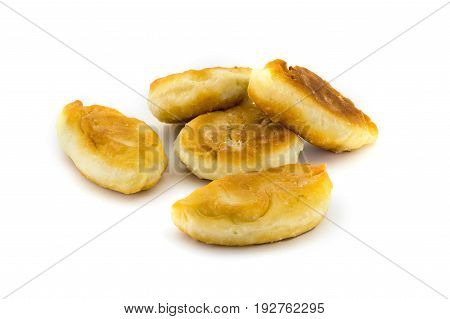 Five homemade Pies with stuffing isolated on white background