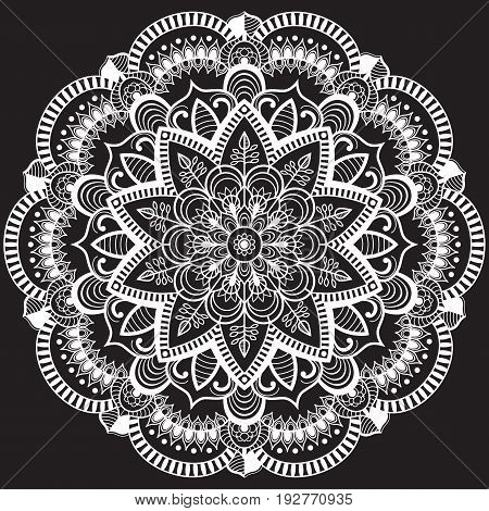 white round indian pattern on black background