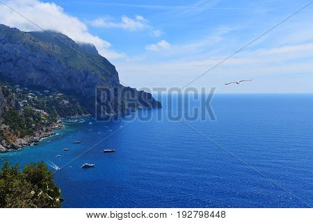 big mountains and sea under blue sky