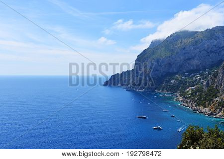 big mountains and sea under blue sky