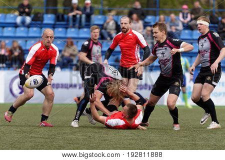ST. PETERSBURG, RUSSIA - MAY 27, 2017: Match Busly, Belarus (red and white shirts) vs Livonia, Latvia during Rugby Europe Sevens Club Champion's Trophy