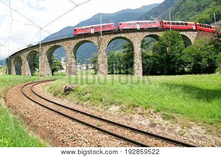 Bernina Express Train At Brusio On The Swiss Alps