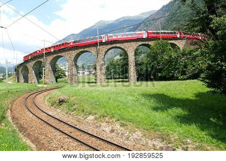 Bernina Express Train At Brusio On The Swiss Alps