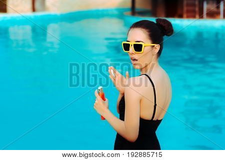 Summer Girl Applying Suncream Lotion by the Pool