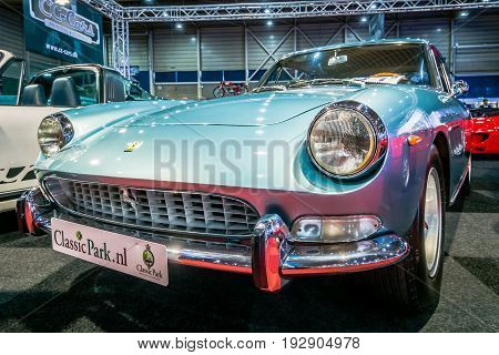 MAASTRICHT NETHERLANDS - JANUARY 14 2016: Sports car Ferrari 330 GT 2+2 Series II 1967. International Exhibition InterClassics & Topmobiel 2016