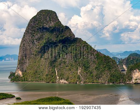 Island mountain sea blue sky white cloud. Landscape abundant nature tropical limestone karst mountain overgrown dense green tree. Nature conservation. Samet Nangshe viewpoint unseen Phang Nga Thailand
