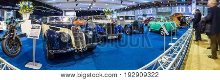 MAASTRICHT NETHERLANDS - JANUARY 14 2016: Various retro cars of the brand BMW. Stand of 