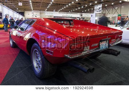 MAASTRICHT NETHERLANDS - JANUARY 14 2016: Sports car De Tomaso Pantera. Rear view. International Exhibition InterClassics & Topmobiel 2016