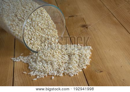 Spilled rice from bowl, lots of white rice, basmati, japanese food