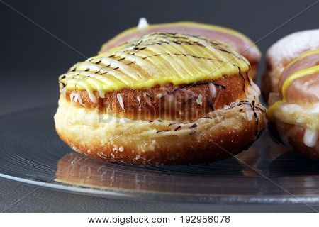 German Donuts - Berliner With Jam And Icing Sugar In A Tray On A Grey Background.