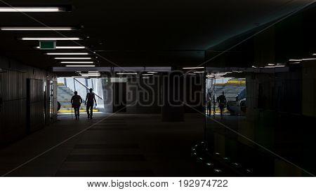 UNDERGROUND PASSAGE - Modern urban pedestrian-style architecture and passerby