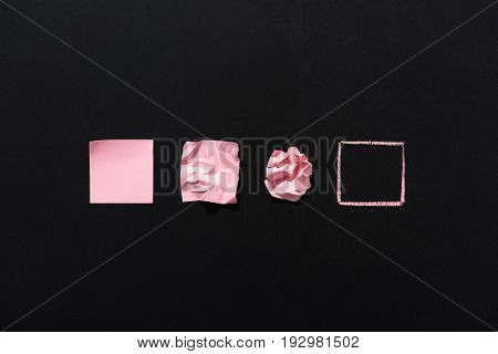 Row Of Pink Blank Notes In Different States Isolated On Black