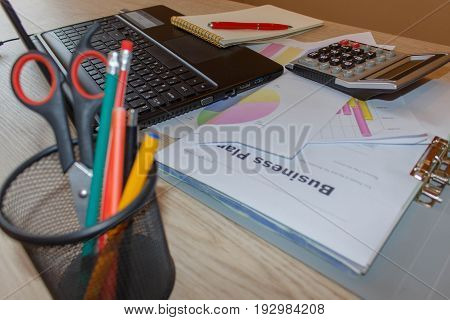 Business finance tax accounting statistics and analytic research concept. Graphs charts business table. The workplace of business people