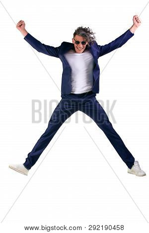 Confident Smart Looking Man Laughing And Jumping Up, Enjoying His Success - Wearing Siut, Isolated O