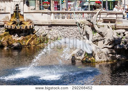 Dusseldorf, Germany - July 02, 2018: Triton Fountain Or Tritonenbrunnen Located At Konigsallee Or Ki