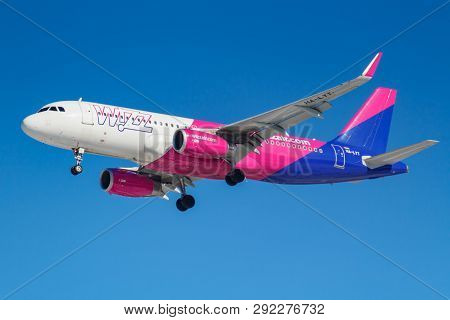 Moscow, Russia - March 26, 2019: Aircraft Airbus A320-232(wl) Ha-lyt Of Wizz Air Against Blue Sky In