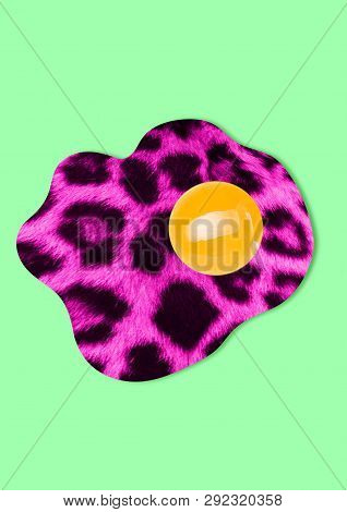 An Alternative Breakfest With Wild Nature. Egg Fried Or Omelette With Bright Pink And Black Leopard 