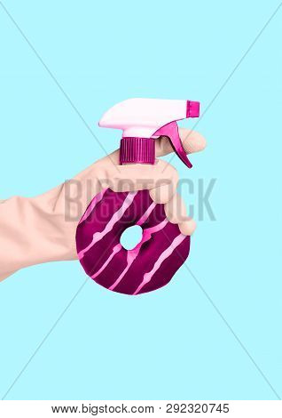An Alternative Cleaning - Sweet Spraing Bottle. Hand In A Housewifely Glove Holding Spray As A Pink 
