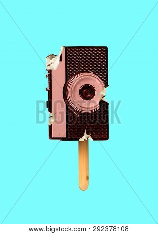 Sweet Photo Is Bitten Off. Photoshooting Tastes Delicious. Oldschool Retro Camera As An Icecream On 