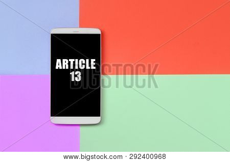 Modern Smartphone With Black Screen On Texture Background Of Fashion Pastel Blue, Yellow, Violet And
