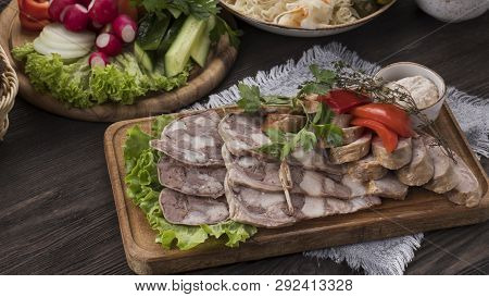 Sliced Pork Saltisons With Homemade Sausage On Cutting Board. Copyspace