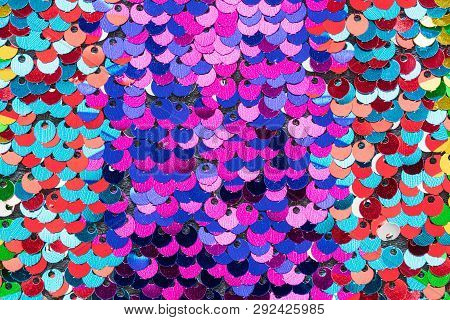 Multicolour Beautiful Iridescent Sequins Texture, Fish Scale Fabric Background, Close Up