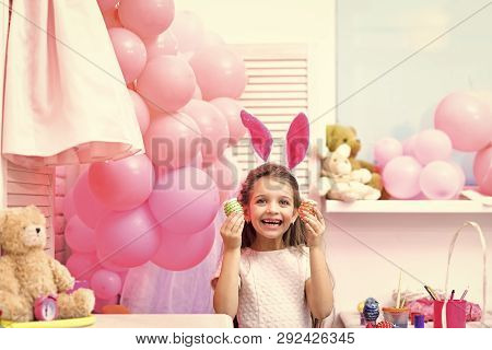 Daughter Paint Handmade Egg At Party Balloons. Gaughter Or Little Girl Kid Paint Easter Eggs