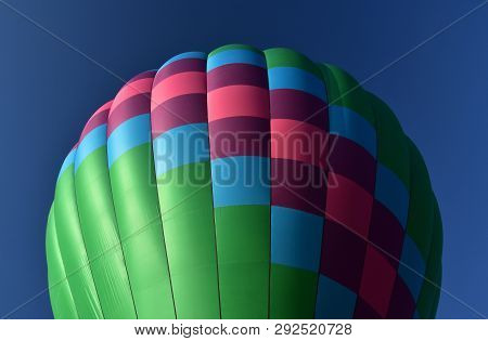 Bottom View Of Colourful Hot Air Balloon As Part Of The Balloon Spectacular Festival.