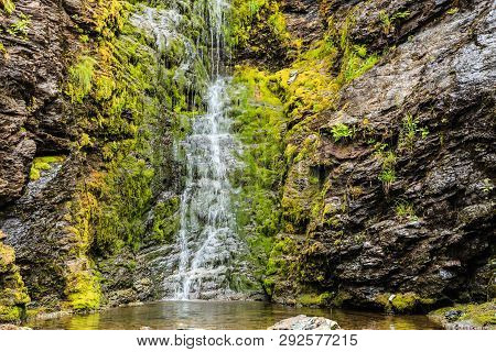 Little Waterfall In Green Summer Mountains, Norway.