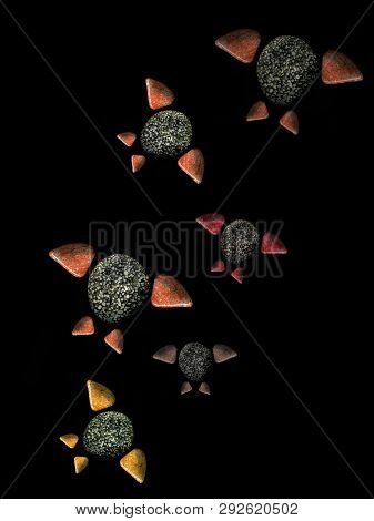 Figures Laid Out By Children From Multi-colored Pebbles. Figure From Multi-colored Stones. Stone Fig