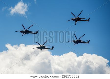 Group Of Military Helicopters Mi-28 In The Sky