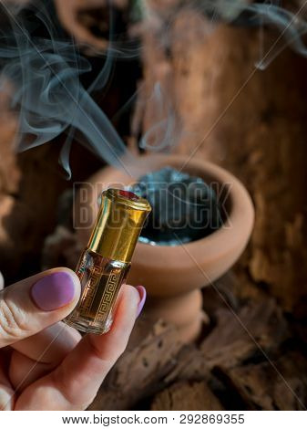 Arabian Oud Attar Perfume Or Agarwood Oil Fragrances In Mini Bottle.