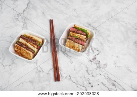 Sandwich Katsu Sando With Beef. Wagyu Katsu. Japanese Cuisine Traditional Food. Trendy Fast Food At