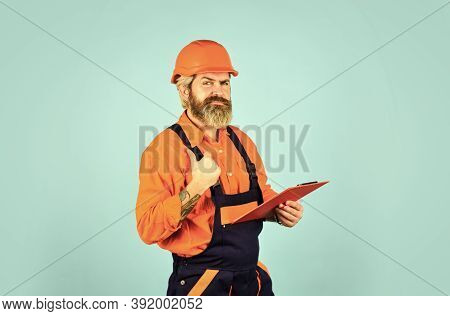 Buy Materials For Renovation. Bearded Storekeeper. Checklist. Foreman With Document. Inspecting. Con