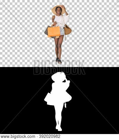 Stylish Young Afro Woman Walking With Shopping Bags, Alpha Chann