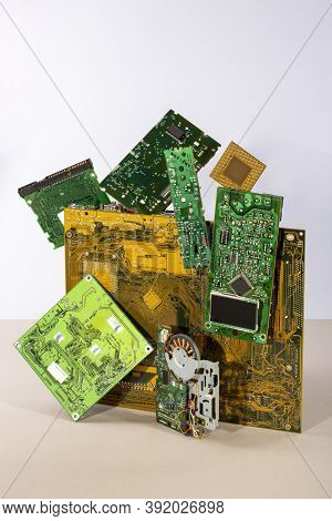 Abstract Figure Folded From Computer Circuit Boards On A Colored Background