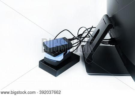 Multiple External Hard Drives Connected To A Monoblock On A White Background.computer With Hard Driv